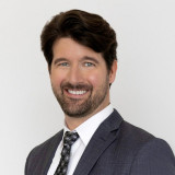 Photo of Adam J. Dugan